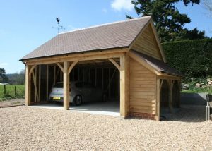 two bay carport with log store1